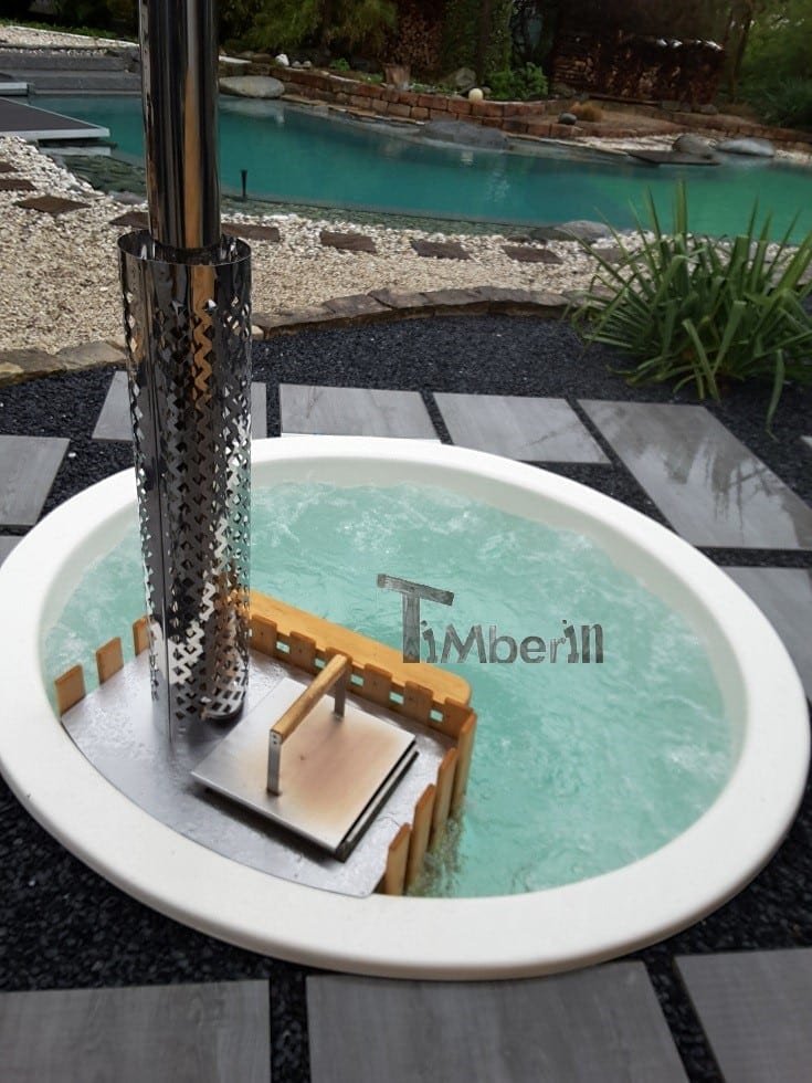 Inground hot tub with the snorkel wood fired heater