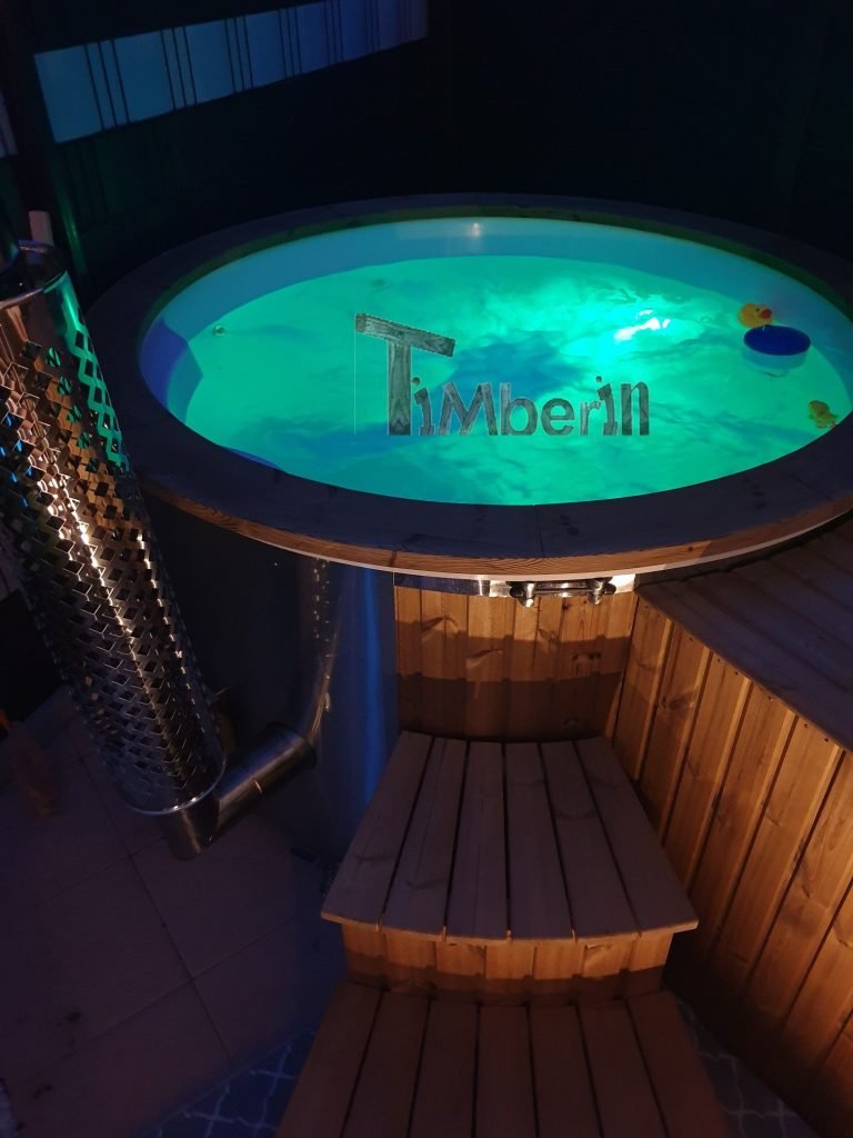 Wood fired hot tub with water and LED