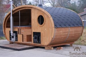 Outdoor oval sauna with an integrated hot tub (42)