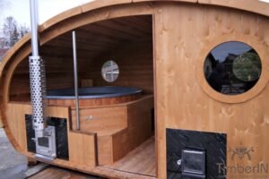 Outdoor oval sauna with an integrated hot tub (43)